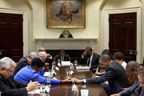 Obama & Cabinet Praying Hurricane Sandy
