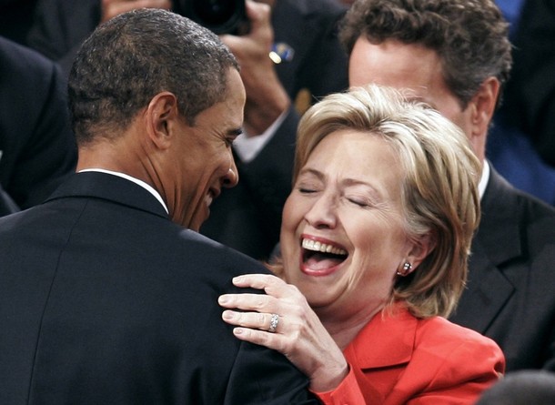 U.S. President Obama greets U.S. Secretary of State Clinton prior to the president's address about health care reform to a joint session of Congress on Capitol Hill in Washington