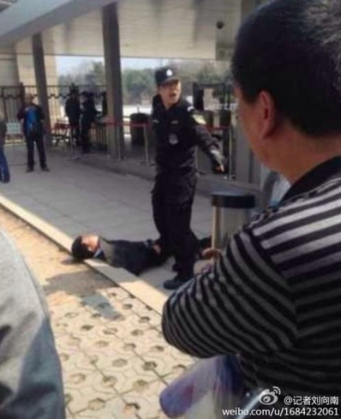 China Police Assault...