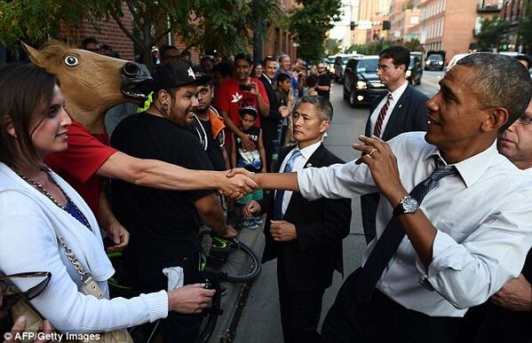 Obama Meets a Man in a Horse Head